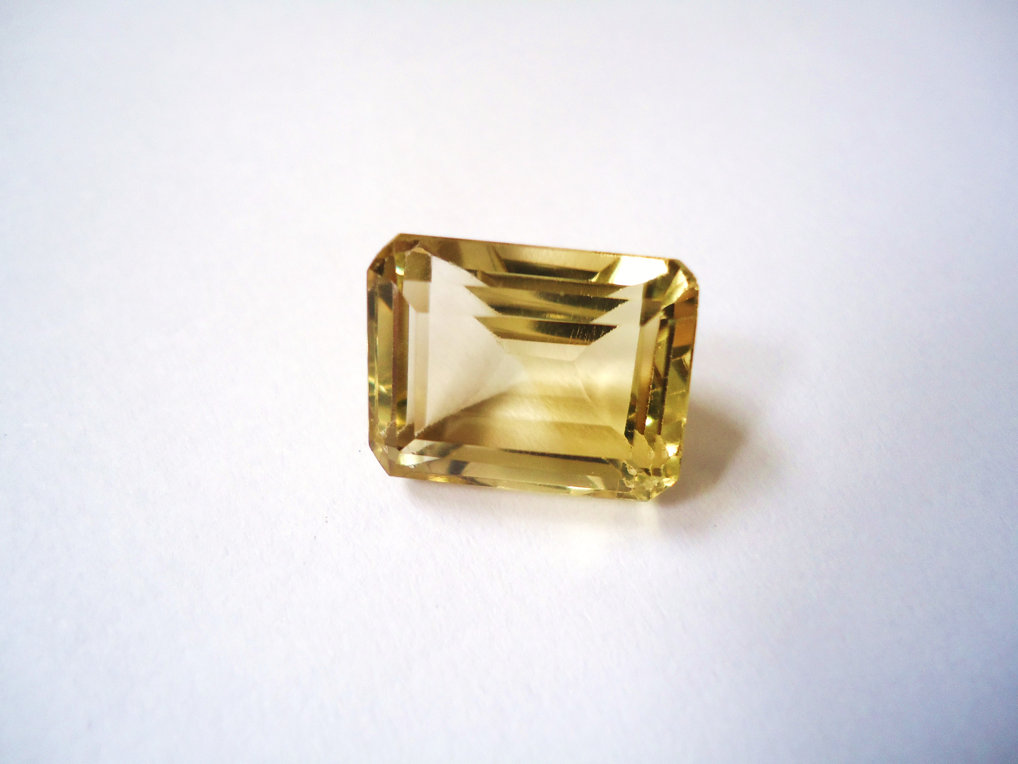 Rectangular faceted pale golden citrine gemstone