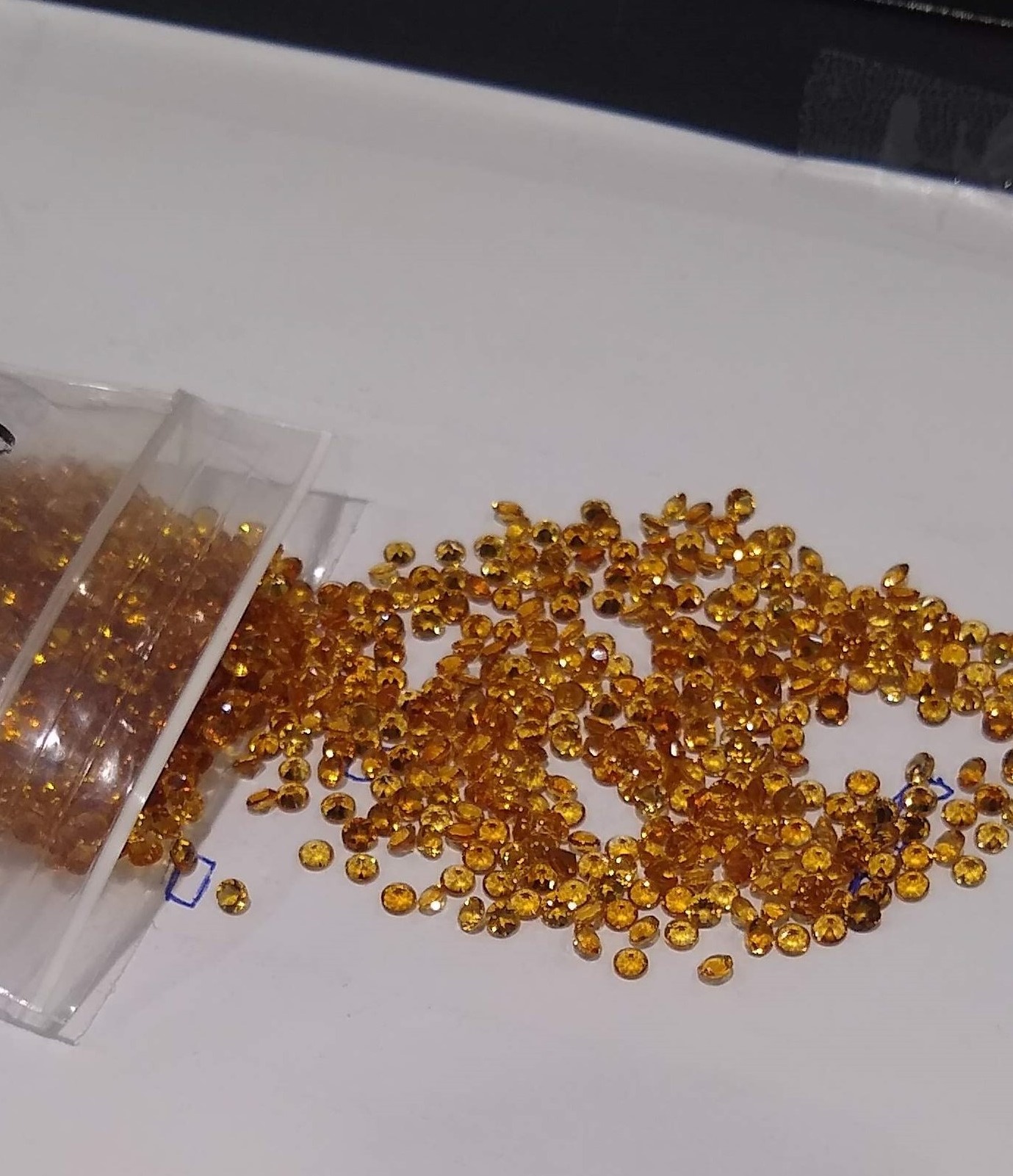 Small round faceted citrine stones