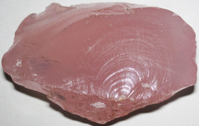 Polished rose quartz slab with rich pink color