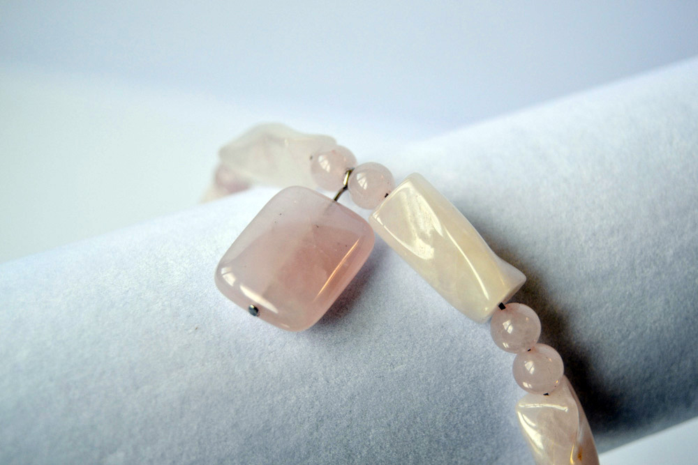 Rose quartz bracelet with polished pink beads and rectangular stones