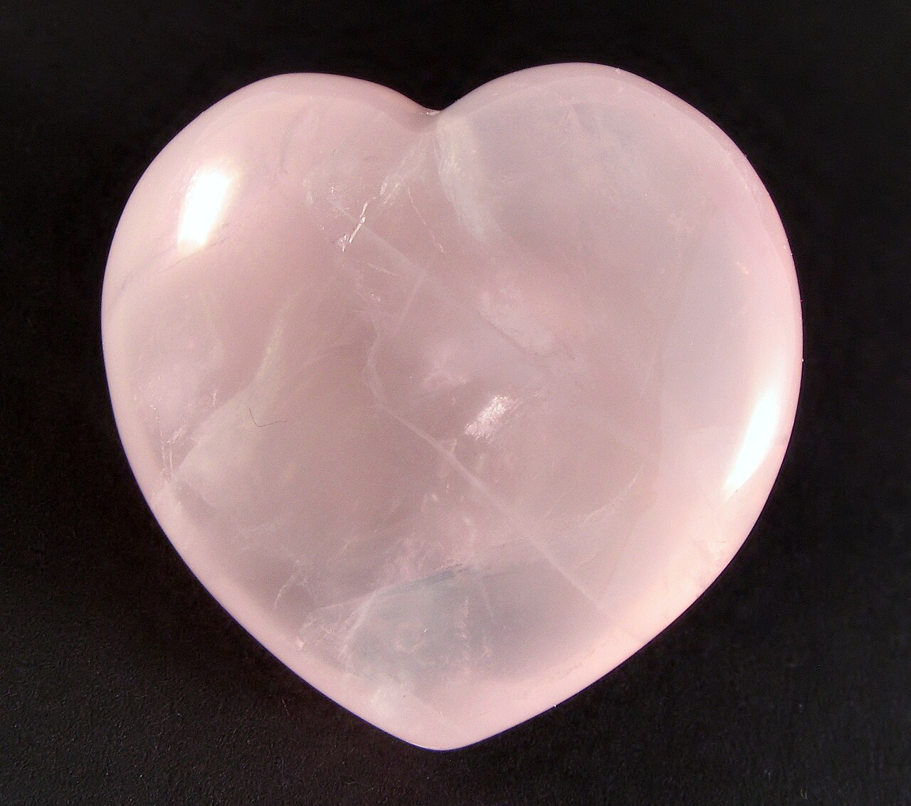 Polished pale-pink rose quartz heart