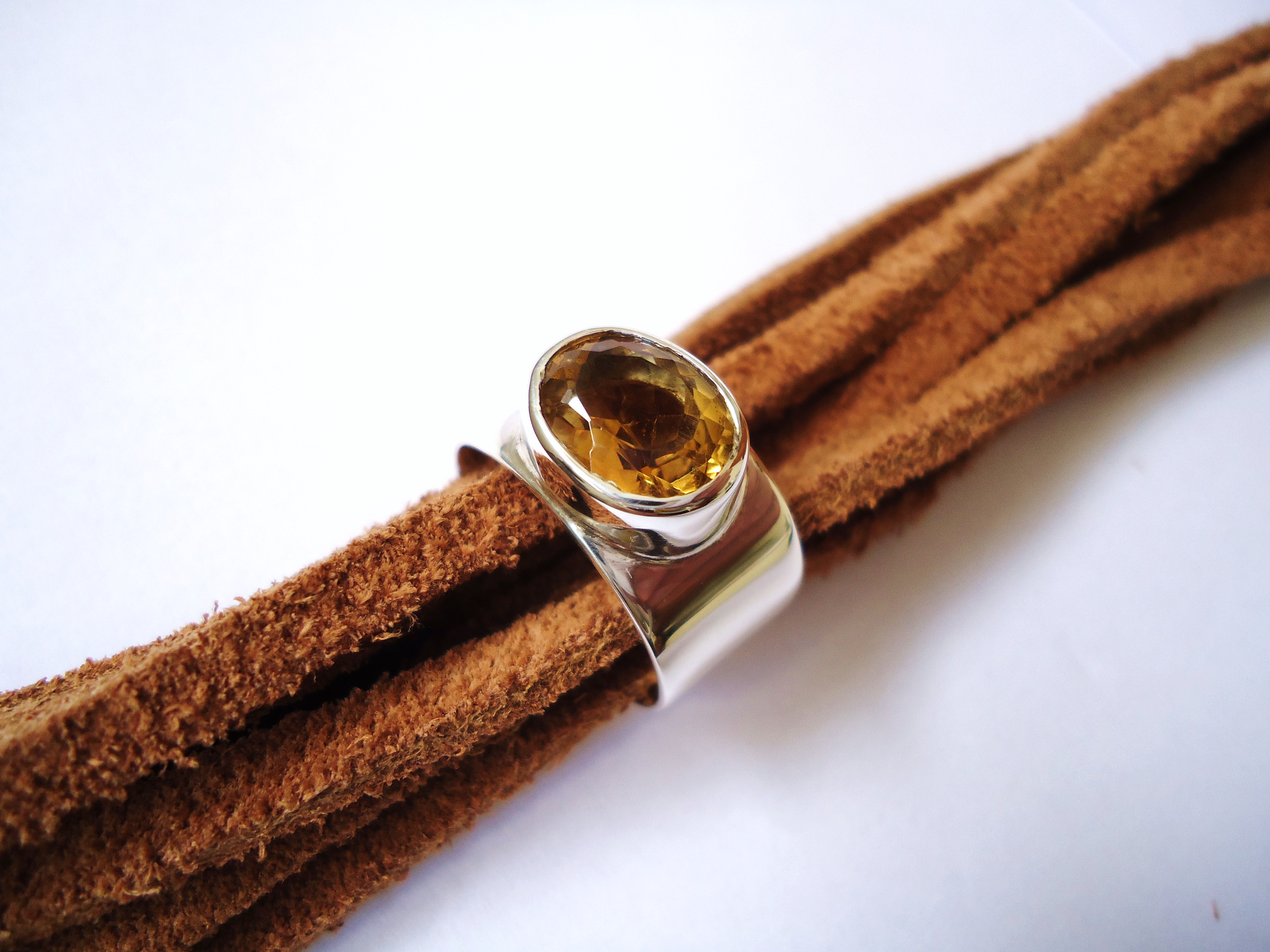 Oval citrine set in a silver ring